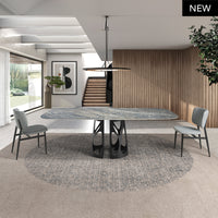 Scopri il Tavolo Ade: design moderno e resistente, piano in marmo porcellanato blu, gambe in acciaio nero. Eleganza e comfort per 10 commensali. Acquistalo ora!