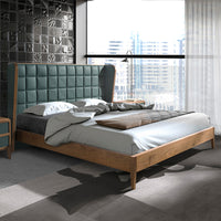 Letto Madrid in una camera moderna con testata verde scuro trapuntata e struttura in legno noce, perfetto per un ambiente elegante.