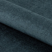 Dettaglio del tessuto verde scuro della sedia Brooke, con texture morbida e resistente per un tocco di eleganza.